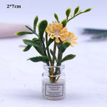 fleurs artificielles miniature verre transparent divers motifs floraux pot petite pierre étiquetteextérieur nature