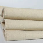 tapis antidérapant tissu texturé tissage apparent industriel brut matériau polyester opacité totale blanc cassé