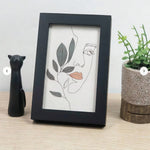 cadre photo moderne minimaliste noir rectangle texturé plastique transparent ouverture bascule support bois