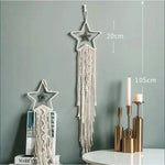tapisserie macramé boho pompons franges beige clair tissé main décoration murale artisanal