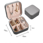 boîte rangement bijoux simili cuir vert clair rose pâle noir moderne pratique fermeture glissière
