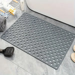 tapis bain douche gris vert perforations anti dérapage moderne salle bain ventilation trous ronds