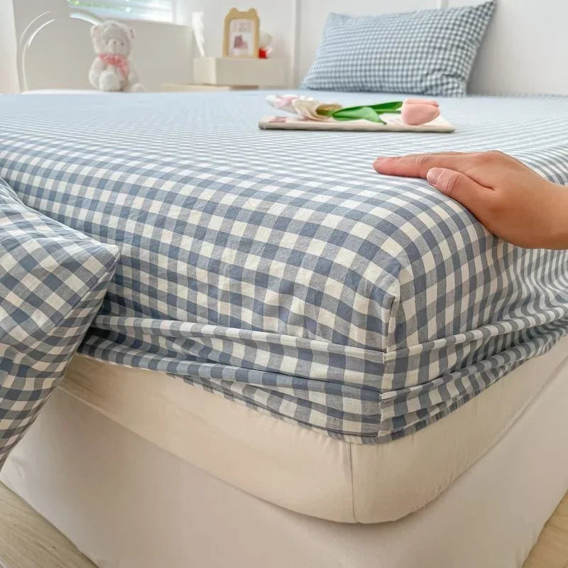 protège matelas carreaux bleu clair gris clair rose clair jaune clair vert clair classique
