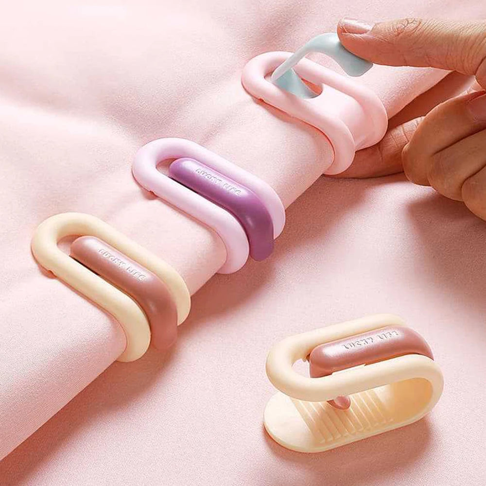 clips rangement moderne rose clair beige vert pastel violet adhésifs minimalistes pièces invisible housse