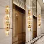 applique murale moderne cristal doré tubes horizontaux lumière led salon luxe élégant