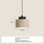 lampe suspendue moderne minimaliste pierre beige brun texture naturelle câble noir salon chambre principal