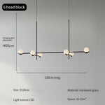 suspension lumineuse moderne sphères translucides structure métallique noir blanc minimaliste plafonnier led contemporain