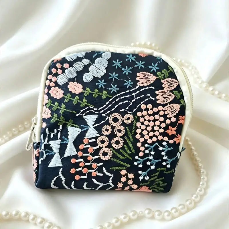 sac rangement bijoux zip fleurs motifs floraux beige doré blanc