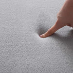 Tapis rectangulaire moderne vert dans une salle de bain