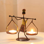 supports bougie métal artisanal figurines humaines couleurs vives mariage décoration intérieure moderne classique