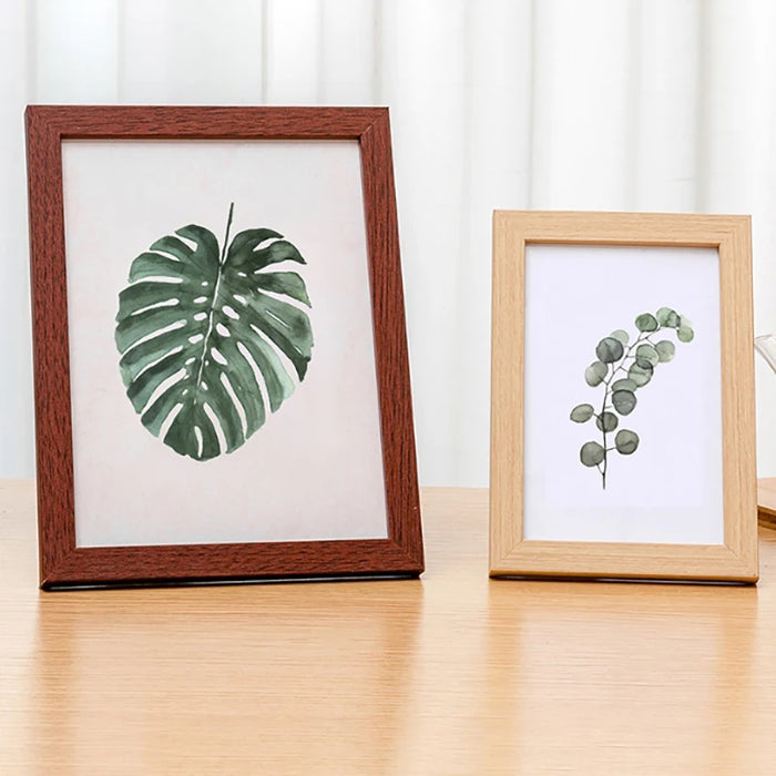 Cadre photo mural en bois 10x15 cm couleur blanc sur mur beige
