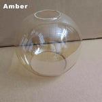 boule verre transparente ambre gris moderne anneau métallique suspension plafonnier lustre minimaliste