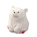 statue animale bois figurine bleu rose motif floral minimaliste yeux stylisés petite deco
