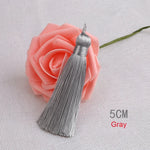 pompons polyester couleur variée 5cm longueur 18cm décoration artisanale rideaux couture pièces