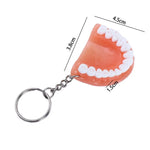 porte clés dents dentiers orange blanc réaliste anneaux métalliques chaînette unisexes adultes