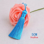 pompons polyester couleur variée 5cm longueur 18cm décoration artisanale rideaux couture pièces