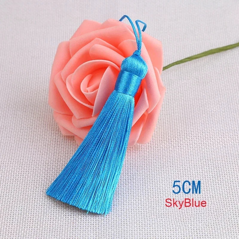 pompons polyester couleur variée 5cm longueur 18cm décoration artisanale rideaux couture pièces