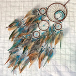 décoration murale attrape rêves ethnique plumes bois marron bleu blanc