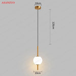 suspension lumineuse moderne sphères translucides blanc doré chambre salon minimaliste