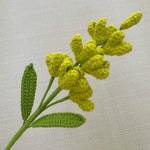 décoration intérieure multicolore fleurs tricotées artisanale jaune vert rose blanc violet tricot