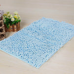 tapis bain polyester anti dérapant lavable machine moderne gris bleu marron texture boules 40x60cm