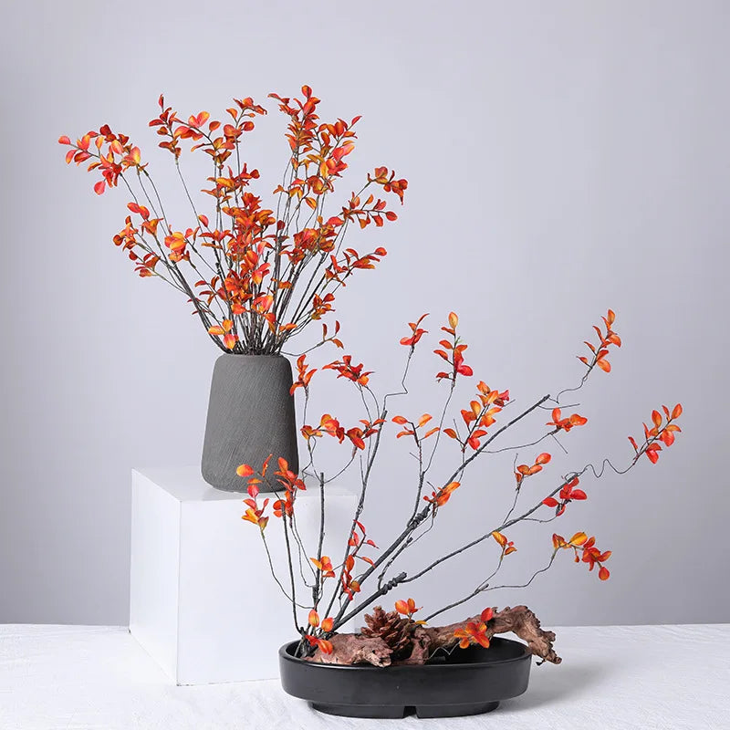 décoration extérieure branche artificielle feuilles rouge orange verte naturelle minimaliste