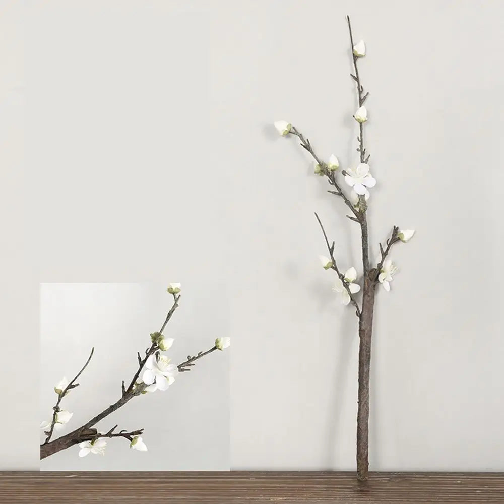 décoration intérieure bouquet fleurs prunier artificielles rose blanches vase transparent minimaliste asian