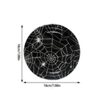 assiettes halloween araignées verres serviettes table noire blanc points brillants toile festive octobre