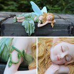 statuette fée dormante résine ailes translucides robe ondulée cheveux bouclés couleur verte bleu clair