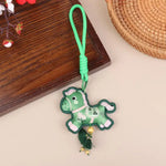 porte clés chevaux stylisés brodés rouge vert marron bleu clochette pompon traditionnel artisanal anneaux
