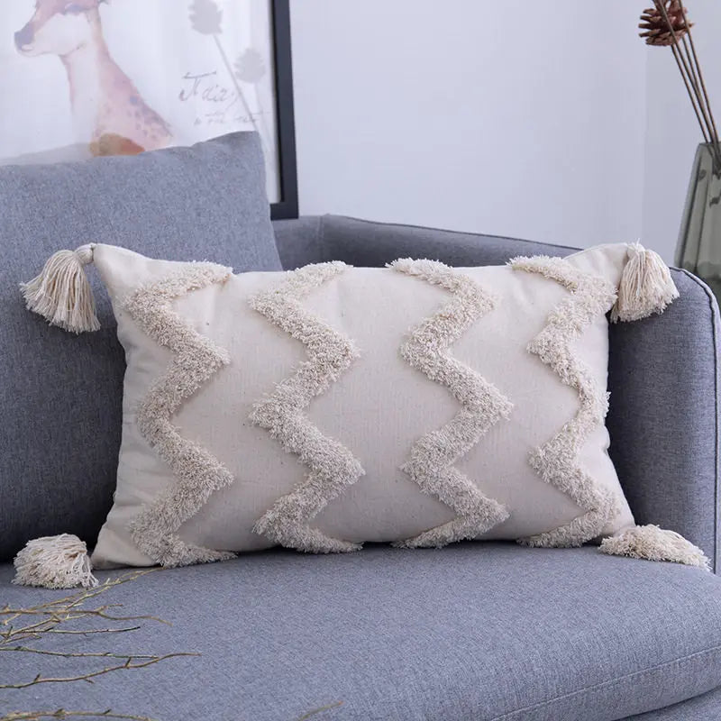 coussins décoratifs bohèmes motifs géométriques blanc cassé franges dentelle