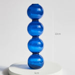 bougeoir moderne verre bleu cobalt texture ondulée décoration intérieure vase support blanc bougie blanche