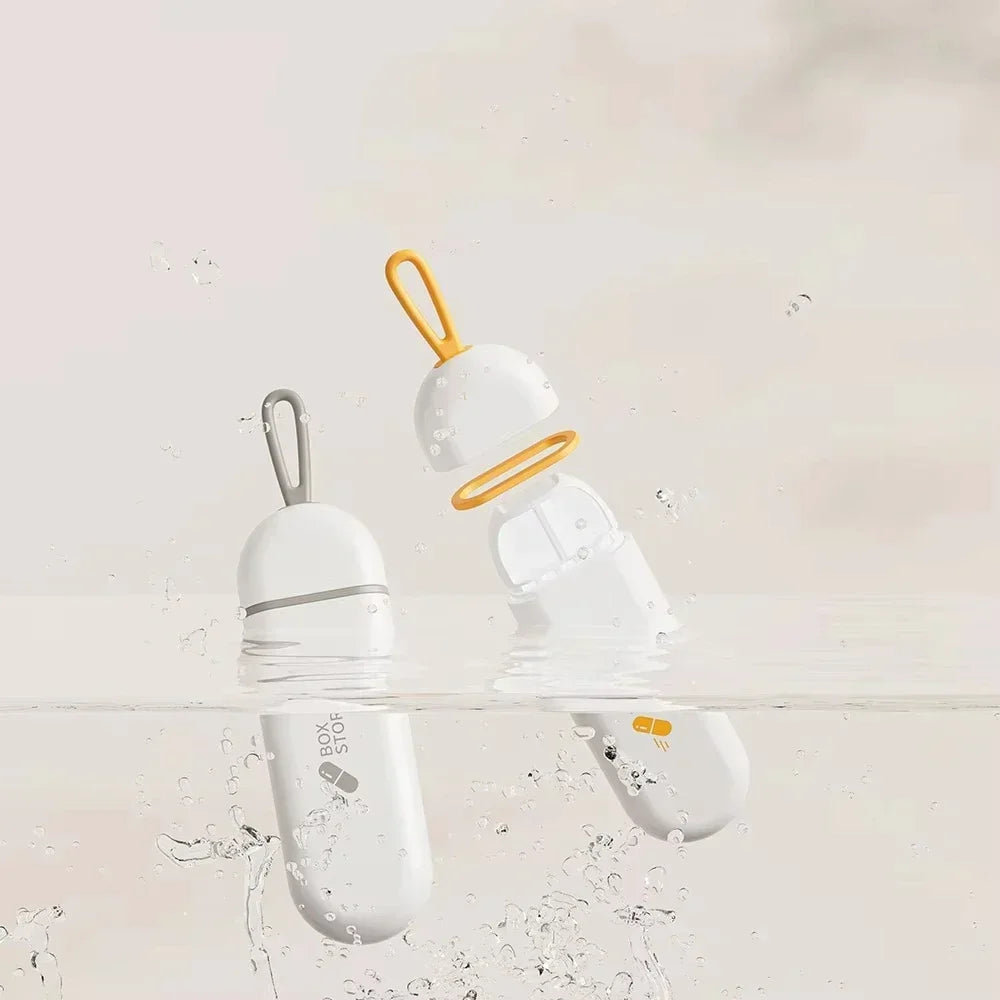 boîte pilules portable étanches compartiments modernes couleurs gris orange rondes