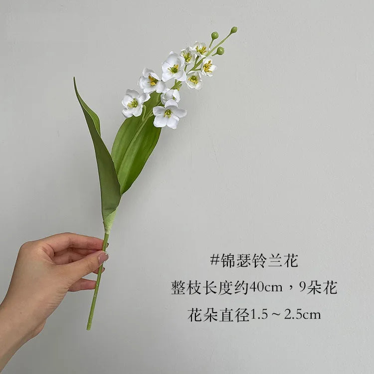 bouquet fleurs artificielles soie muguet rose blanche feuilles vertes décoration mariage anniversaireintérieur
