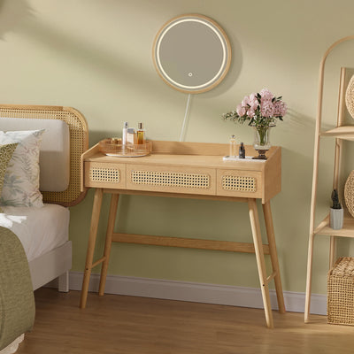 Coiffeuse bohème avec miroir rond éclairé et tiroirs en rotin