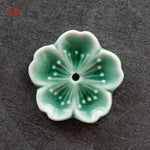 support bâtonnets encens fleurs stylisées artisanal rose bleu vert jaune blanc
