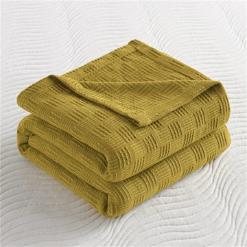couverture coton tricotée motif géométrique bleu gris jaune canapé lit maison voyage été