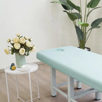 table massage adulte gris clair moderne couverture tabouret pieds
