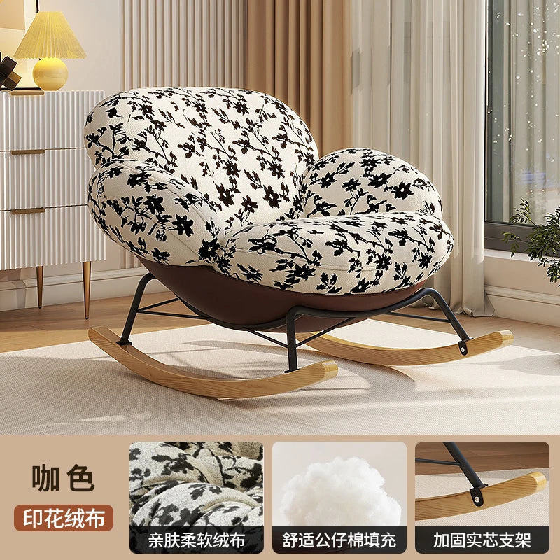 fauteuil bascule moderne beige noir orange roulettes coussin repos minimaliste salon