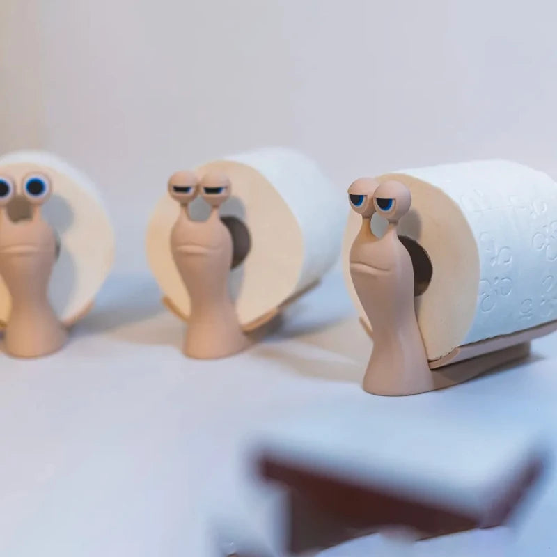 porte rouleaux toilette escargot forme moderne minimaliste décoration humoristique yeux bleus papier texturé