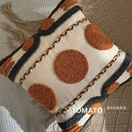 taies d'oreiller géométriques brodées boho chic couleurs beige orange gris franges respectueuses environnement decoration