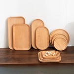 assiettes bois naturel assiettes carrées ovales différentes tailles minimaliste rustique