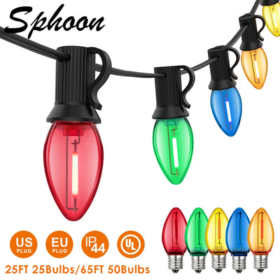 Guirlande lumineuse extérieure C7 RGB multicolore dans un jardin