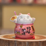 chat souriant tirelire céramique japonaise motifs floraux couleur rouge vert rose bleu jaune