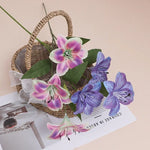 fleurs artificielles lys violet rose blanc décoration moderne mariage intérieur anniversaire baby shower