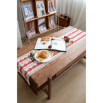 chemin table blanc rouge motif géométrique triangles bordure ajourée traditionnel festif