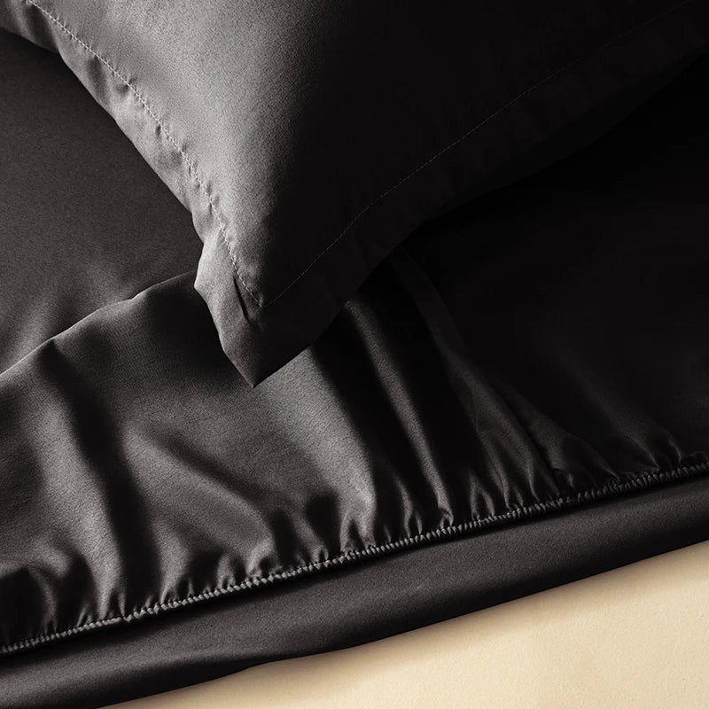 housse lit noire uni satinée élastique moderne 140cm 160cm 200cm polyester