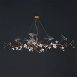 Suspension lumineuse moderne oiseaux transparents branches dorées fleurs blanches led verre chrome poli chambre
