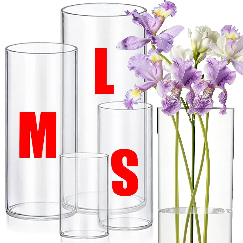 vases verre transparent hauteurs différentes lettres imprimées fleurs aquarium poissons rouges figurine tête chat