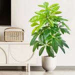 plante artificielle moderne arbre monstera feuilles vertes decoration intérieure pot blanc contemporain exposition maison